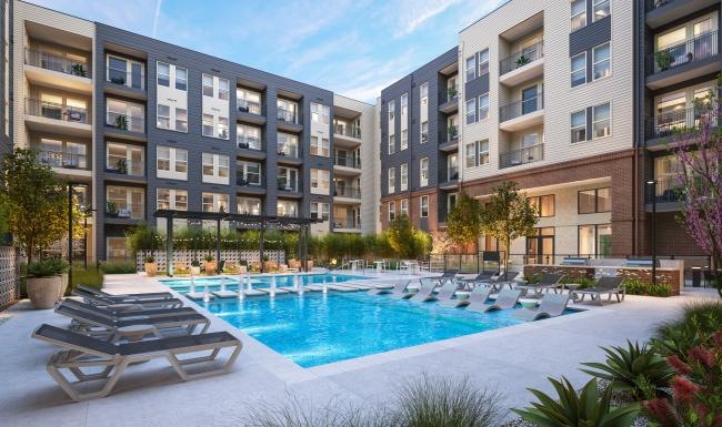 a swimming pool in a courtyard between buildings